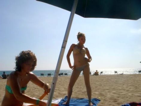 emily-osment-beach-bikini-1.jpg